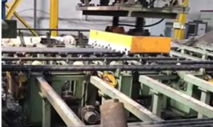Pinza Magnética sobre Robot Pórtico Paletizado 7 Tubos de Acero